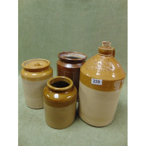 229 - G.D. Owen Oswestry stoneware flagon, container and three others. (4)