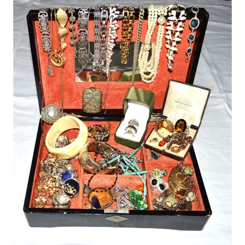 87 - Black lacquered jewellery box and a collection of costume jewellery.
