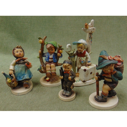 111 - Five Hummel figures.