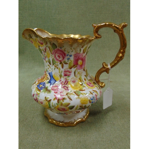 115 - Hammersley & Co gilt edged floral jug.