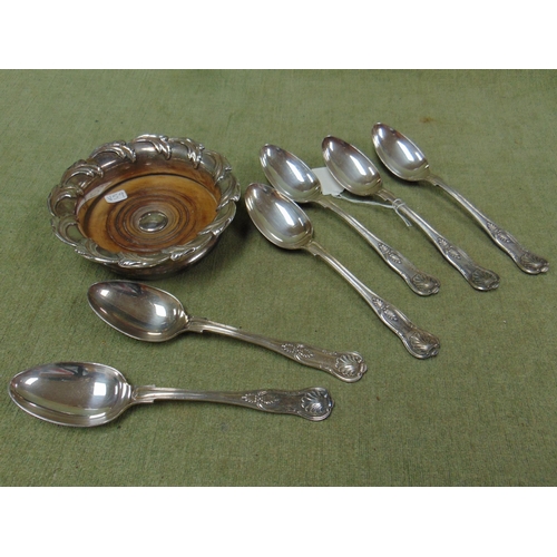 116 - Six plated King's pattern  spoons, and a plated bottle coaster.