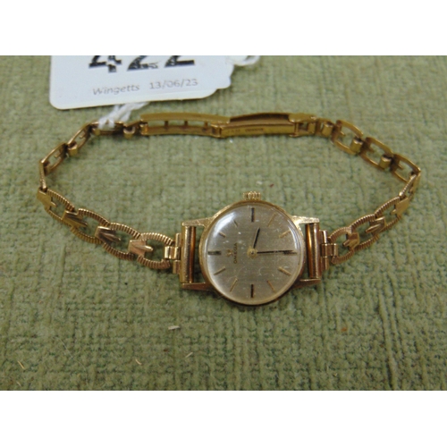 422 - Omega 9ct gold ladies wrist watch , having link strap.