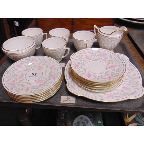 92 - Minton Petunia pattern gilt edged approx 19 piece tea set .