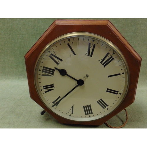 1 - Octagonal double sided ER GPO electric wall clock, having Roman numerals.