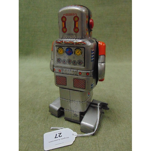 27 - Retro clockwork model robot.