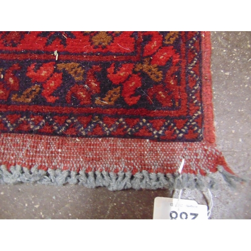 288 - Persian red ground runner, having geometric pattern. 115 x 33