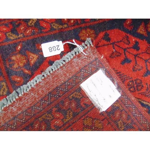 288 - Persian red ground runner, having geometric pattern. 115 x 33