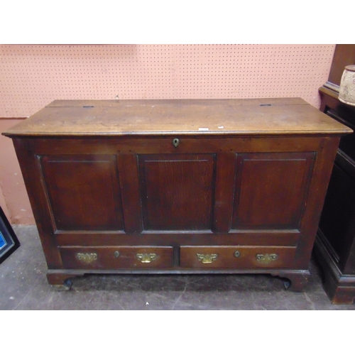 380 - Antique oak mule chest, lift up lid, triple panel front, pair of short drawers with brass handles an... 