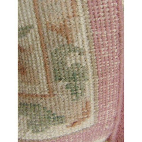 349 - Chinese pink ground floral rug, 94 x 66