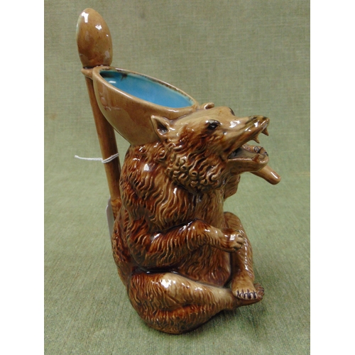 153 - Joseph Holdcroft English majolica Bear form syrup jug, having spoon form handle. 9