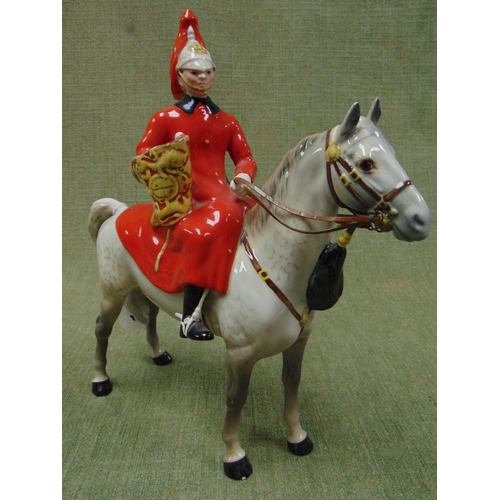 184 - Beswick figure group, lifeguard on grey horse. (sf)