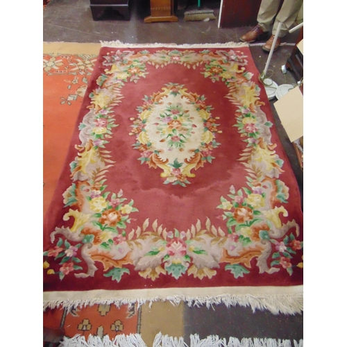 318 - Floral decorated Chinese rug, 80 x 51