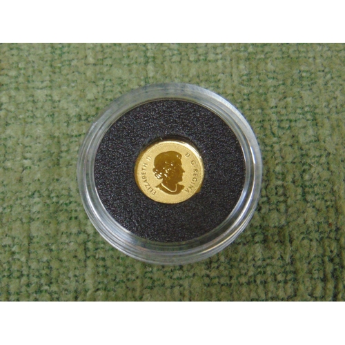 50 - Cased Royal Canada Mint 24 ct gold proof maple leaf coin.