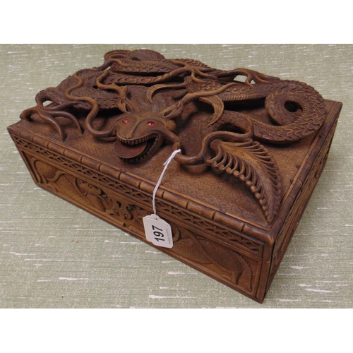 197 - Reproduction oriental trinket box, having dragon decoration. 5 x 12 x 8.5