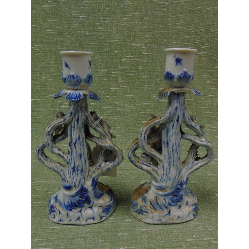 119 - Pair of Joseph Gaspard Robert continental figural candle holders. Each 7.5