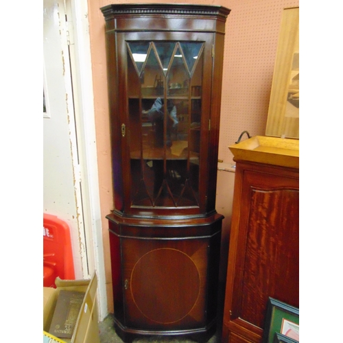 278 - Reproduction twin pillar dining table , four chairs and a reproduction corner cupboard.