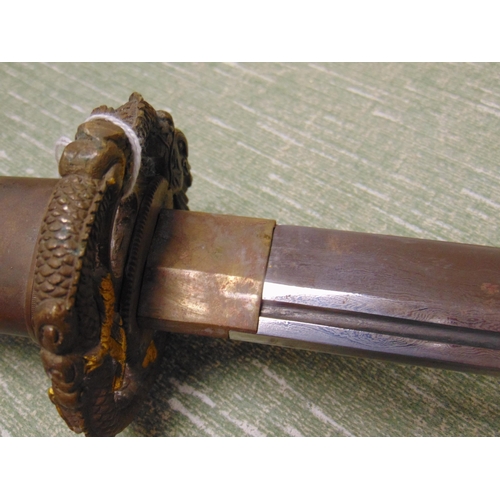 161 - Japanese Dragon Samurai sword, in scabbard, signed to handle. 39