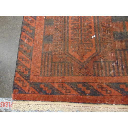 21 - Persian red and black ground rug, having geometric pattern. 52 x 32