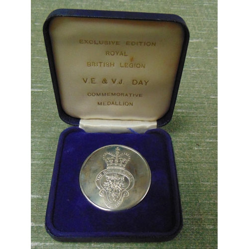 82 - Cased medallion, commemorating British Legion V.E & V.J day 4 years of peace.