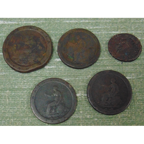 84 - Four cartwheel pennies and one other coin.