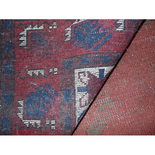 121 - Good Persian red and blue ground carpet, 120 x 75