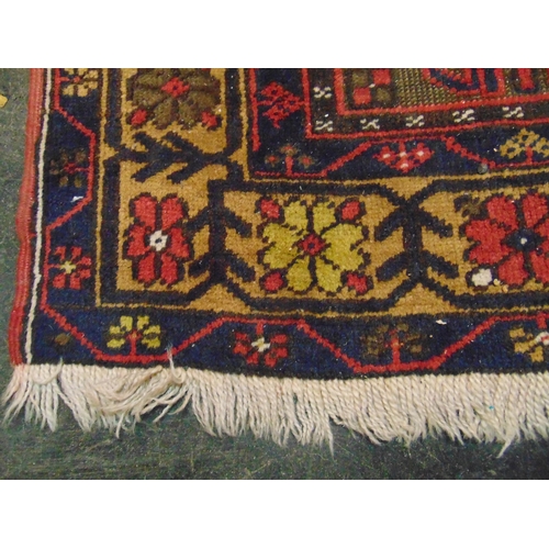 24 - Persian red and blue ground rug, having geometric pattern, 97 x 49