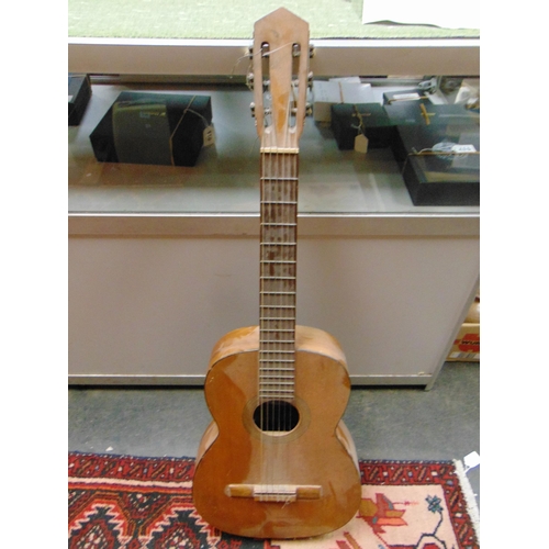 525 - An acoustic guitar.