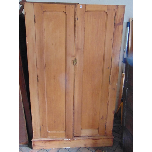 416 - Pitch pine double door wardrobe.