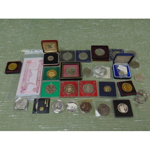 110 - Small quantity of paper money, commemorative coins, etc.