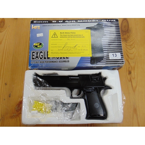 13 - Boxed Eagle model 6mm BB air gun. Please note: Purchasers must be over 18 and photographic ID must b... 