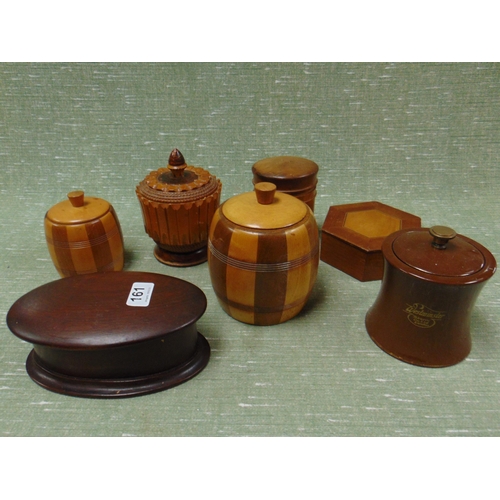 161 - Collection of wooden tobacco jars.