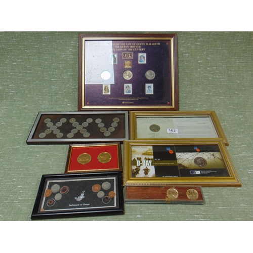 162 - Various framed and glazed collector's coins.