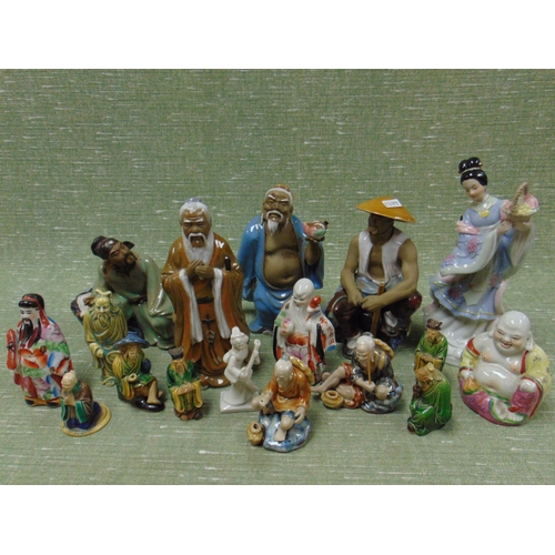 238 - Collection of Oriental china figures.