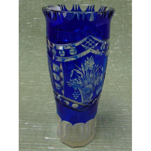 29 - Cut glass blue and clear coloured vase, having etched decoration. 8