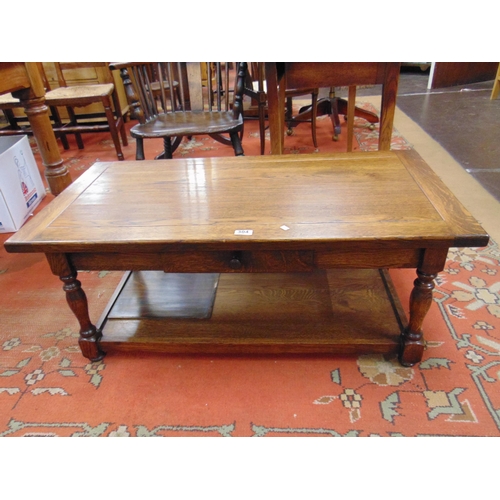 304 - Modern oak centre table, single drawer, on baluster turned supports joined by an undertier,  17 x 41... 