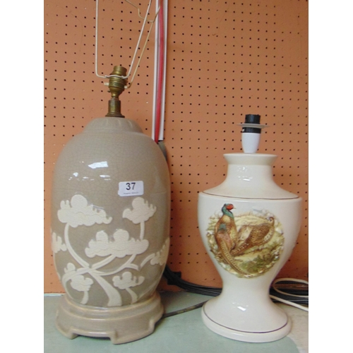 37 - Pottery table lamp decorated with trees and a pheasant decorated lamp. (2)