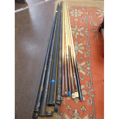 370 - Collection of vintage snooker/billiard cues with metal cue cases, to include a J. Ashcroft & Co, one... 