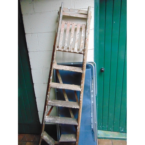 398 - Wooden stepladder and two deck chairs.