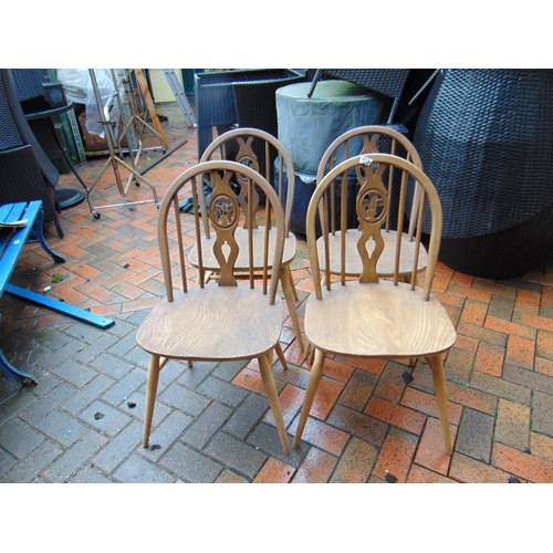 411 - Ercol set of four Fleur de Lys low back dining chairs.