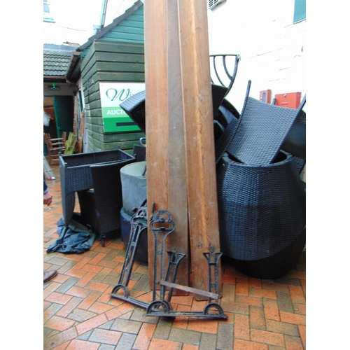 415 - Antique pitch pine railway  bench, having cast iron ends embossed 'patent automatic' and 'Wellington... 