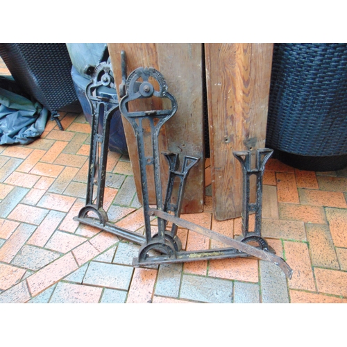 415 - Antique pitch pine railway  bench, having cast iron ends embossed 'patent automatic' and 'Wellington... 