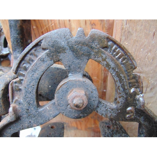 415 - Antique pitch pine railway  bench, having cast iron ends embossed 'patent automatic' and 'Wellington... 