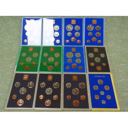 67 - 12 cased sets, Coinage of Great Britain & Northern Ireland.