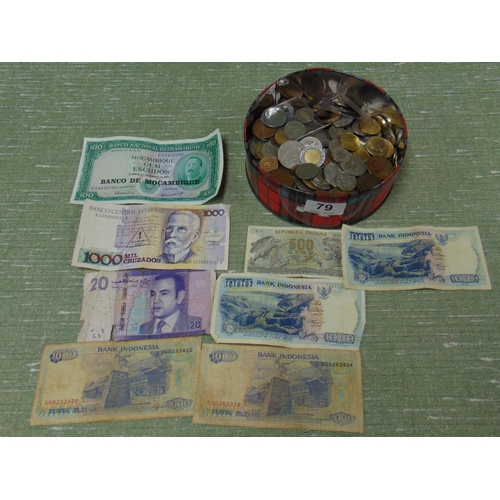 79 - Quantity of coins and paper money.