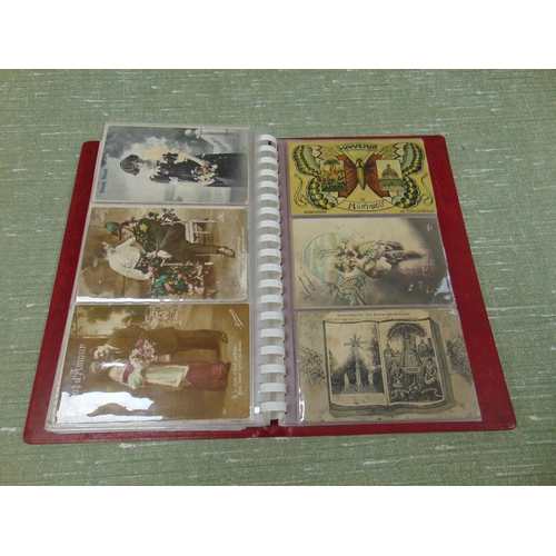 108 - Post card album and contents.