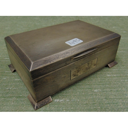 112 - Silver rectangular cigarette box, having lift up lid, engine turned decoration and on bracket feet, ... 