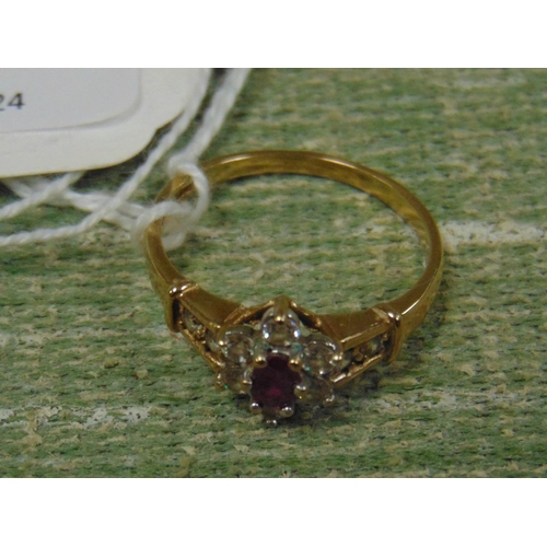 119 - 9ct gold ring, set with oval ruby and diamonds.