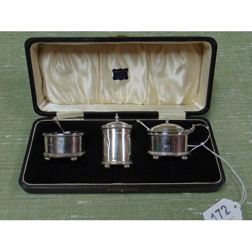 172 - Cased silver three piece condiment set, Birmingham 1930.