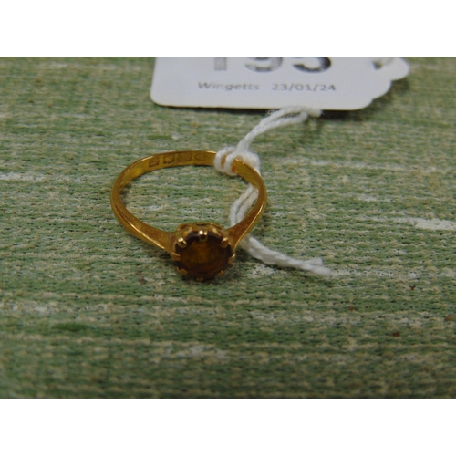 195 - 22 ct gold ring, set with amber stone, size N.