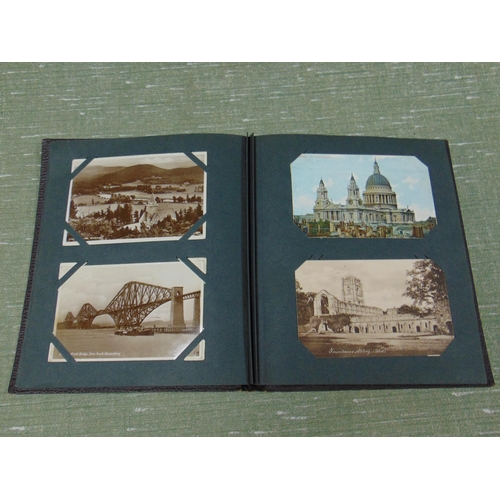 204 - Postcard album and contents.